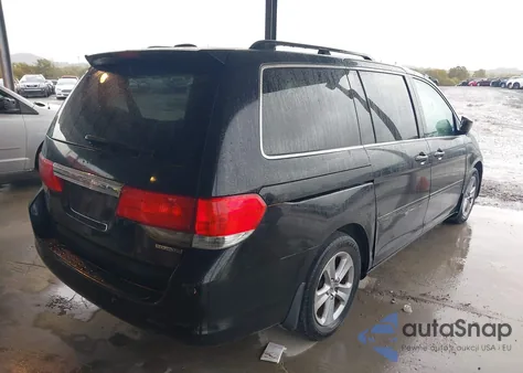 2010 Honda Odyssey Touring z USA, uszkodzony, nr VIN 5FNRL3H97AB039089